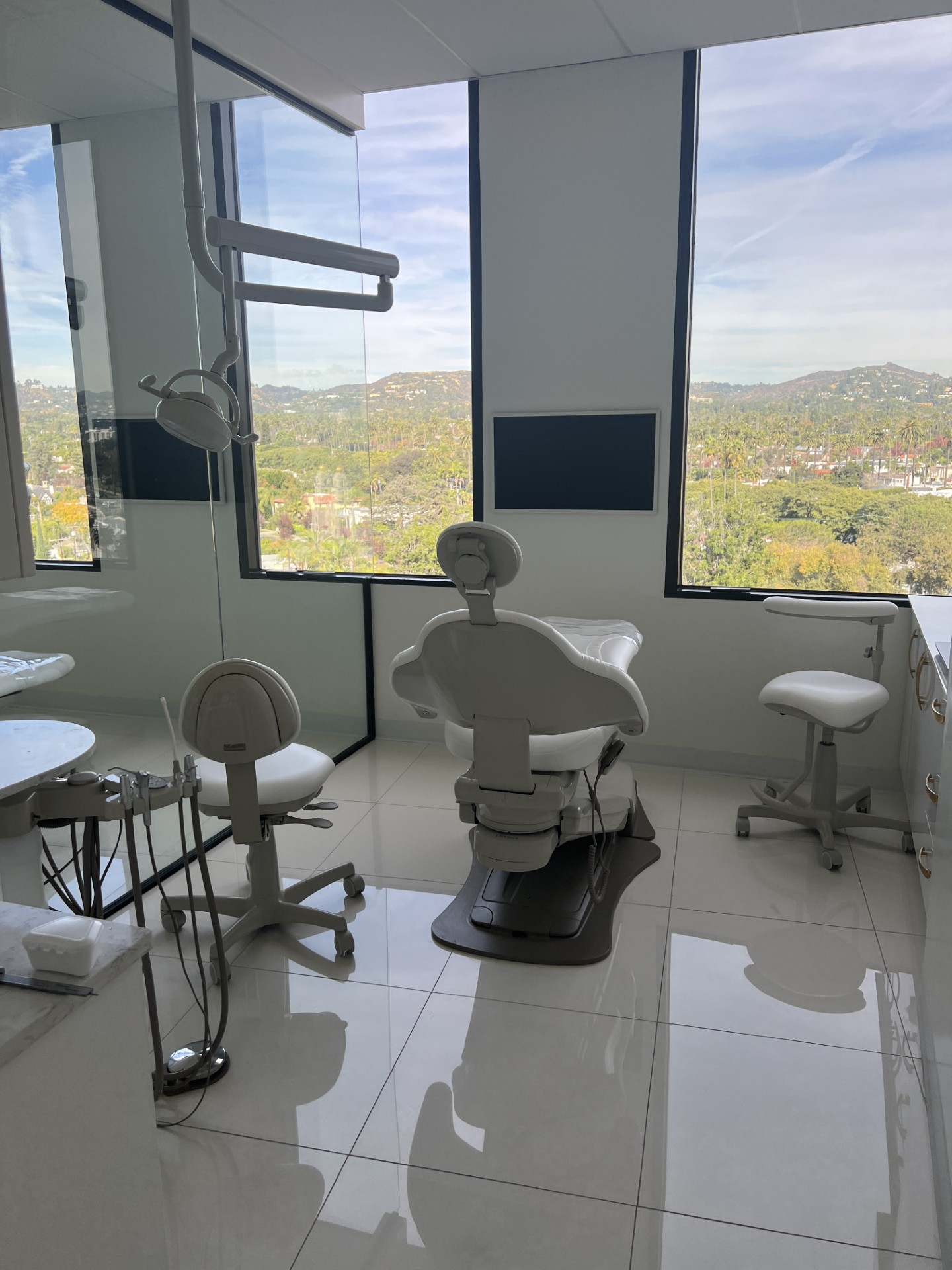 Finished dental operatory with treatment chair and cabinetry